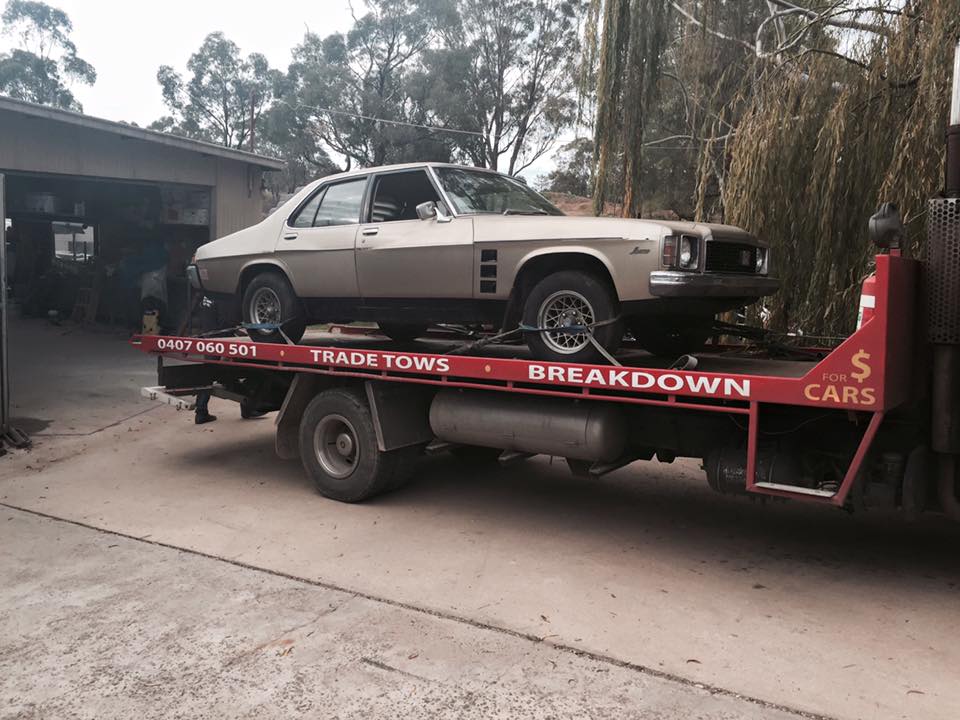 A picture of a silver Holden GTS on the Bent and Broke Towing truck